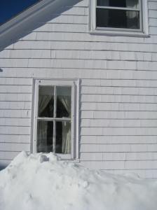 side of house in snow